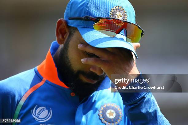 Virat Kohli of India looks on dejected during the ICC Champions Trophy Final match between India and Pakistan at The Kia Oval on June 18, 2017 in...