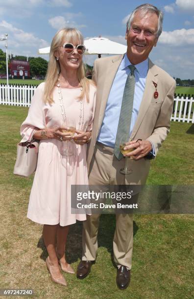 Susan Sangster and Charles Delevingne attend the Cartier Queen's Cup Polo final at Guards Polo Club on June 18, 2017 in Egham, England.