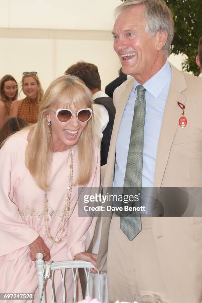 Susan Sangster and Charles Delevingne attend the Cartier Queen's Cup Polo final at Guards Polo Club on June 18, 2017 in Egham, England.