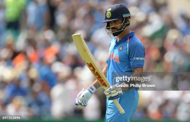 Virat Kohli of India leaves the field after being dismissed during the ICC Champions Trophy final match between India and Pakistan at the Kia Oval...