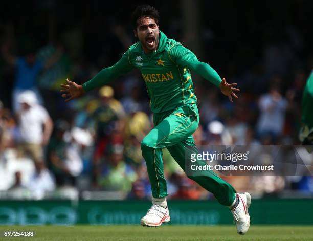 Mohammad Amir of Pakistan celebrates after claiming the wicket of India's Virat Kohli during the ICC Champions Trophy Final match between India and...