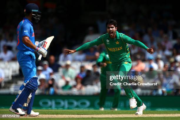 Mohammad Amir of Pakistan celebrates after claiming the wicket of India's Virat Kohli during the ICC Champions Trophy Final match between India and...