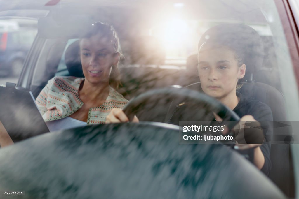Learning to Drive, Alert, Nervous Woman Student Driver Taking Driving Education Lesson Test