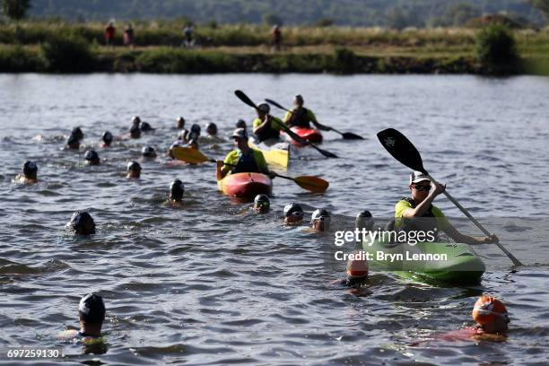Athletes start the Ironman 70.3 Luxembourg-Region Moselle race on June 18, 2017 in Remich, Luxembourg.