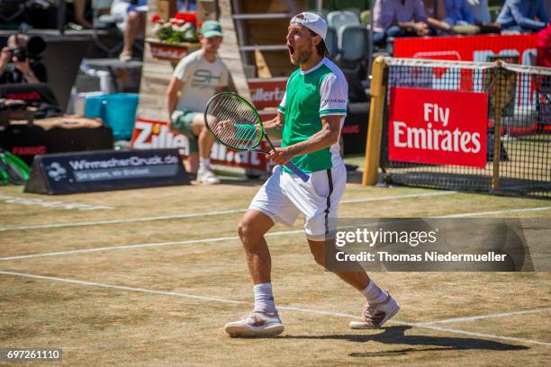 Lucas Pouille of France celebrates his victory after the MercedesCup men's singles final between Feliciano Lopez of Spain and Lucas Pouille of France...