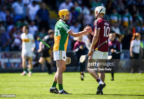 Laois , Ireland - 18 June 2017; Pat Camon of Offaly and Jason Flynn of Galway shake hands following the Leinster GAA Hurling Senior Championship...