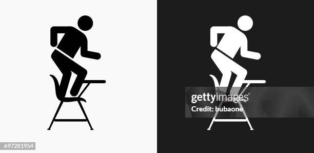 misbehaving on school desk icon on black and white vector backgrounds - naughty in class stock illustrations