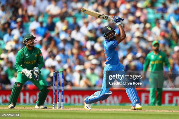 Hardik Pandya of India hits a six during the ICC Champions trophy cricket match between India and Pakistan at The Oval in London on June 18, 2017