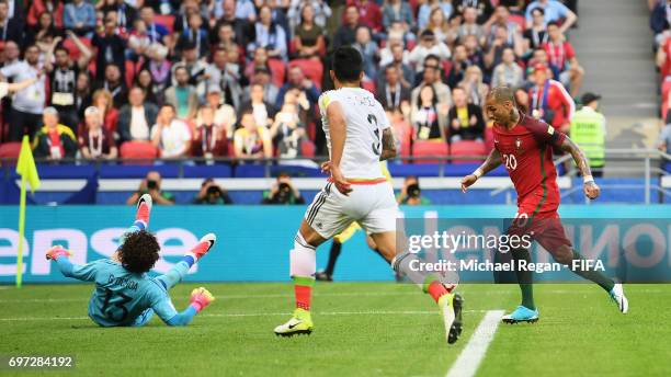 Ricardo Quaresma of Portugal scores his sides first goal past Guillermo Ochoa of Mexico during the FIFA Confederations Cup Russia 2017 Group A match...