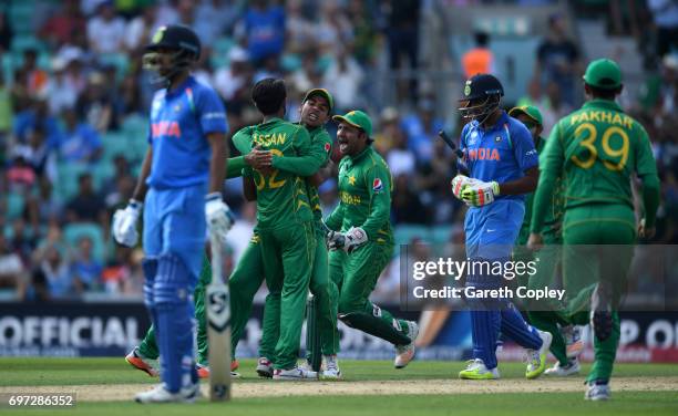 Pakistan celebrate after Hasan Ali dismisses Ravichandran Ashwin of India during the ICC Champions Trophy Final between India and Pakistan at The Kia...