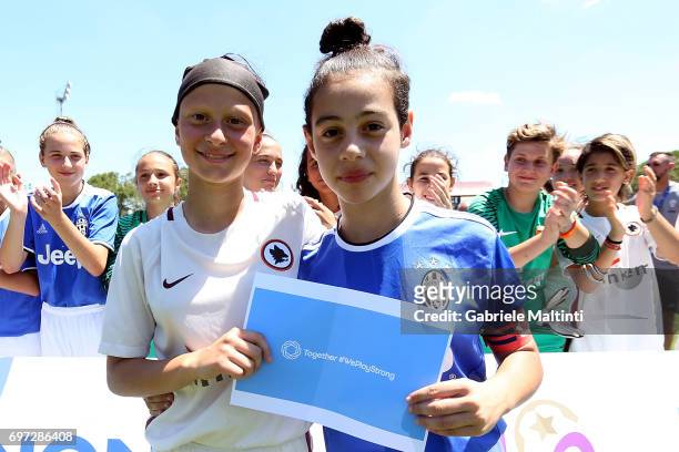 Young players pose for the camera during the Italian Football Federation during 9th Grassroots Festival at Coverciano on June 18, 2017 in Florence,...