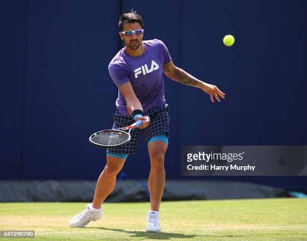 Janko Tipsarevic of Serbia hits a forehand shot during a practice session ahead of the Aegon Championships at Queens Club on June 18, 2017 in London,...