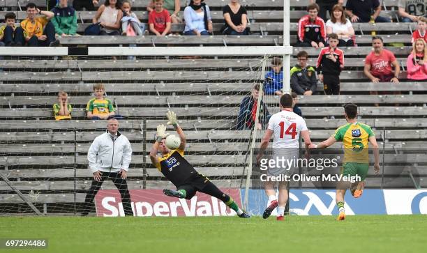 Monaghan , Ireland - 18 June 2017; Sean Cavanagh of Tyrone has his shot saved by Mark Anthony McGinley of Donegal during the Ulster GAA Football...