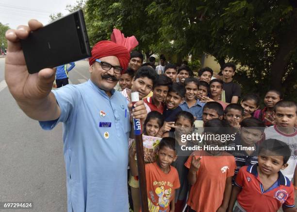 Traffic Tau participates on the Raahgiri Day at Sushant Lok near Galleria Market, organized by MCG, on June 18, 2017 in Gurugram, India. The day is a...