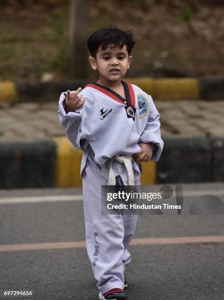 Small kid participates on the Raahgiri Day at Sushant Lok near Galleria Market, organized by MCG, on June 18, 2017 in Gurugram, India. The day is a...