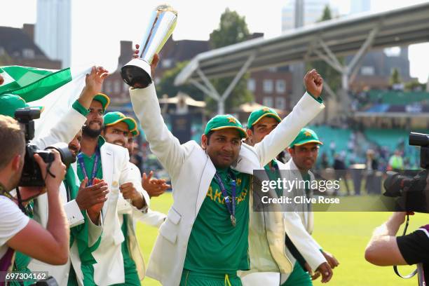 Sarfraz Ahmed of Pakistan lifts the winners trophy as Pakistan win the ICC Champions trophy cricket match between India and Pakistan at The Oval in...