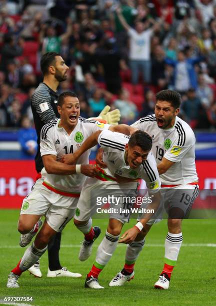 Hector Moreno of Mexico celebrates scoring his sides second goal with his Mexico team mates during the FIFA Confederations Cup Russia 2017 Group A...