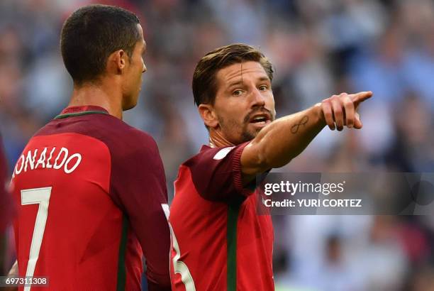 Portugal's forward Cristiano Ronaldo and Portugal's midfielder Adrien Silva react during the 2017 Confederations Cup group A football match between...