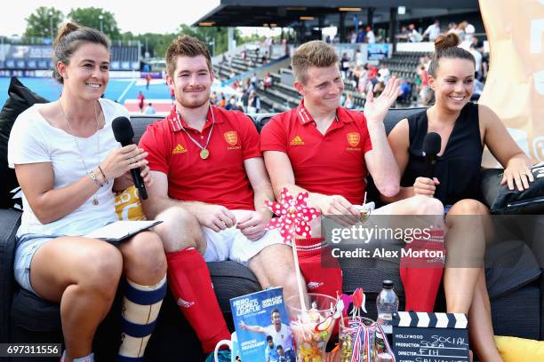 Henry Weir of England and Sam Ward of England speak to members of the England Hockey media staff after the Hero Hockey World League Semi Final match...