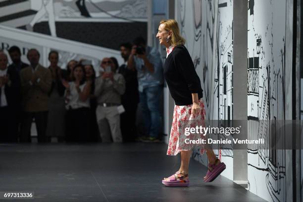 Miuccia Prada acknoledges the audience after the Prada show during Milan Men's Fashion Week Spring/Summer 2018 on June 18, 2017 in Milan, Italy.