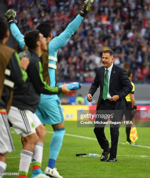 Juan Carlos Osorio, head coach of Mexico celebrates his sides second goal during the FIFA Confederations Cup Russia 2017 Group A match between...