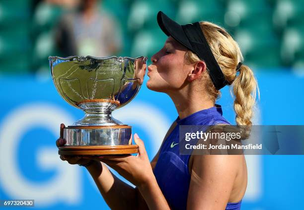 Donna Vekic of Croatia lifts the trophy after victory in her Women's Singles Final match against Johanna Konta of Great Britain during day 7 of the...