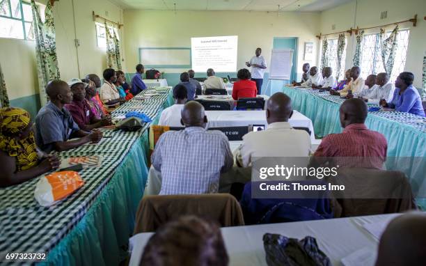 Kakamega County, Kenya African farmers during a training course in dairy farming with the focus on "weather data via SMS" at the Bukura Agricultural...