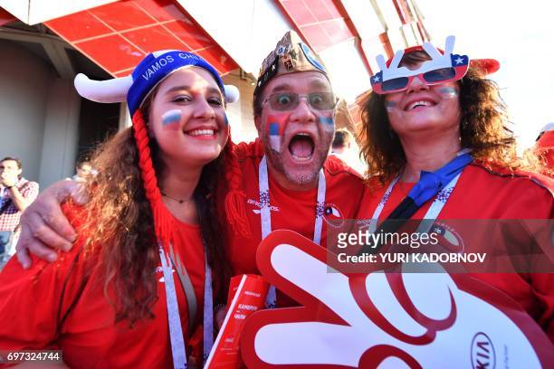 Chile supporters pose as they arrive to attend the 2017 Confederations Cup group B football match between Cameroon and Chile at the Spartak Stadium...