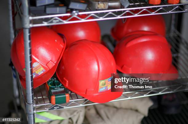 Nairobi, Kenya Protective helmets are placed on a shelf in a training facility for solartechnicians and energy auditors at Strathmore University on...