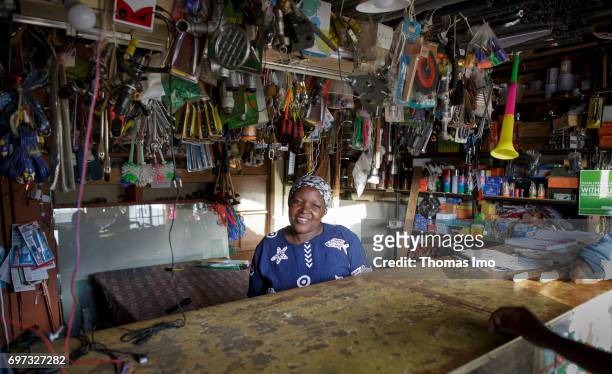 Talek, Kenya Portrait of a saleswoman in her shop for household goods on May 17, 2017 in Talek, Kenya.