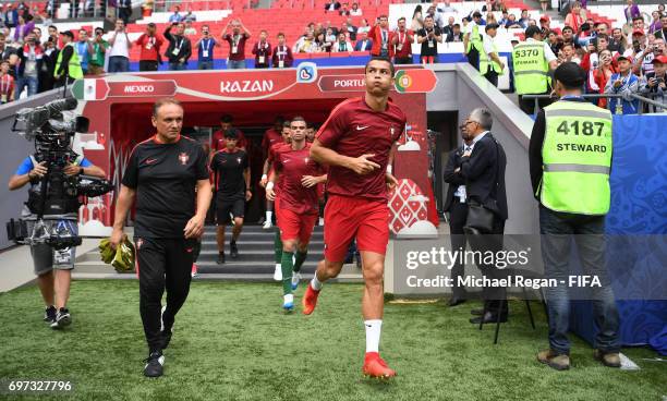 Cristiano Ronaldo of Portugal walks out for the warm up prior to the FIFA Confederations Cup Russia 2017 Group A match between Portugal and Mexico at...