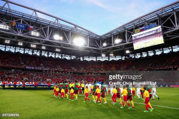 The Cameroon and Chile teams line up prior to the 2017 FIFA Confederations Cup Russia Group B match between Cameroon and Chile at Spartak Stadium on...