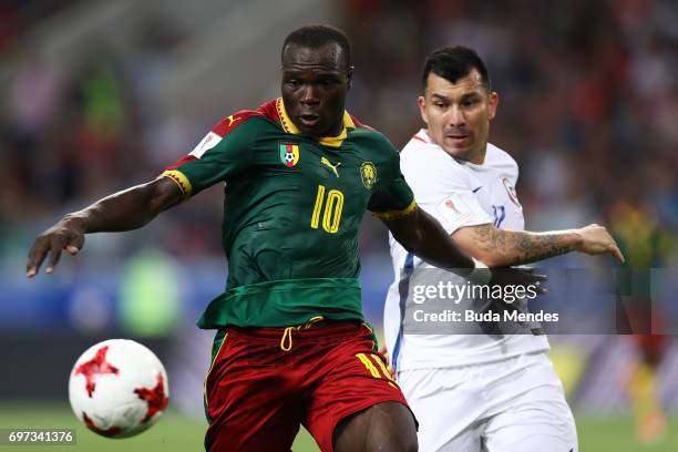 Vincent Aboubakar of Cameroon is put under pressure from Gary Medel of Chile during the FIFA Confederations Cup Russia 2017 Group B match between...