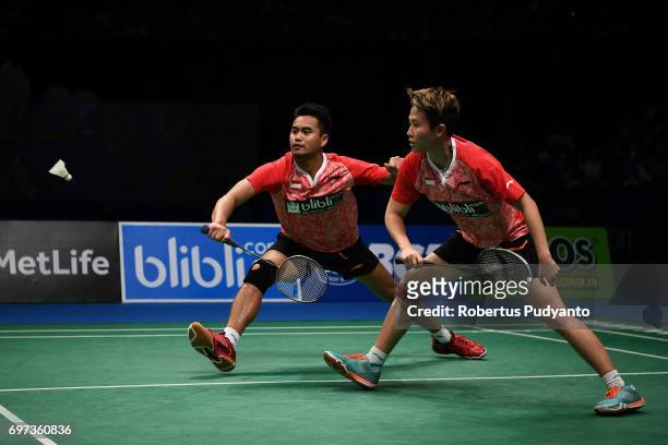 Tontowi Ahmad and Liliyana Natsir of Indonesia compete against Zheng Siwei and Chen Qingchen of China during Mixed Double Final match of the BCA...
