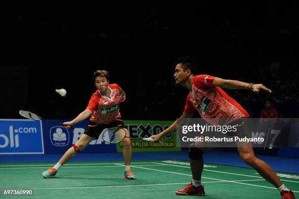 Tontowi Ahmad and Liliyana Natsir of Indonesia compete against Zheng Siwei and Chen Qingchen of China during Mixed Double Final match of the BCA...