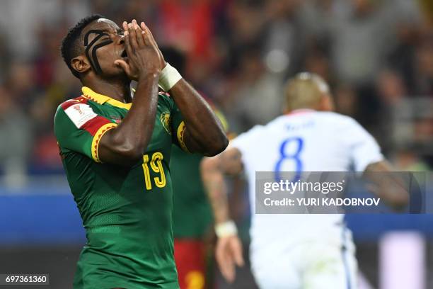 Cameroon's defender Collins Fai reacts after Chile scored during the 2017 Confederations Cup group B football match between Cameroon and Chile at the...