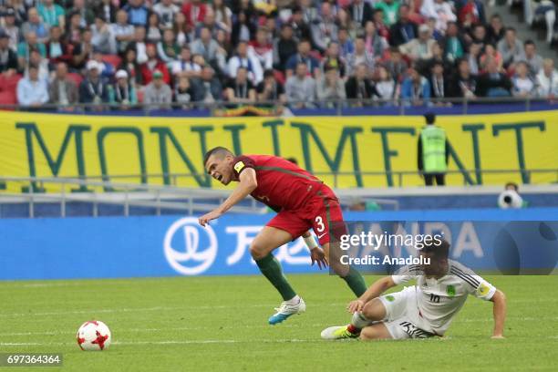 Pepe of Portugal in action against Hector Herrera of Mexico during the FIFA Confederations Cup 2017 group A soccer match between Portugal and Mexico...