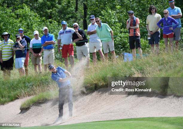 Brendan Steele of the United States plays his shot from a bunker on the fourth hole during the final round of the 2017 U.S. Open at Erin Hills on...