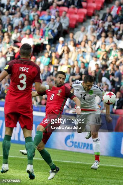Joao Moutinho of Portugal in action against Javier Hernandez of Mexico during the FIFA Confederations Cup 2017 group A soccer match between Portugal...
