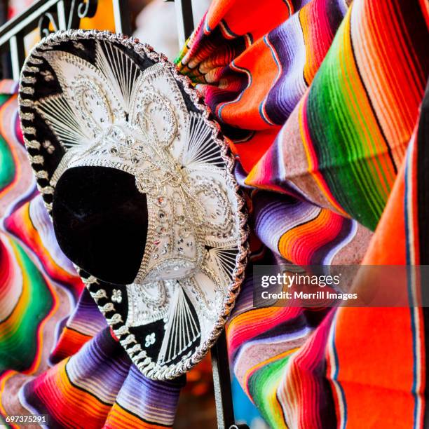 mexican sombrero hat and textiles - sombrero stock pictures, royalty-free photos & images