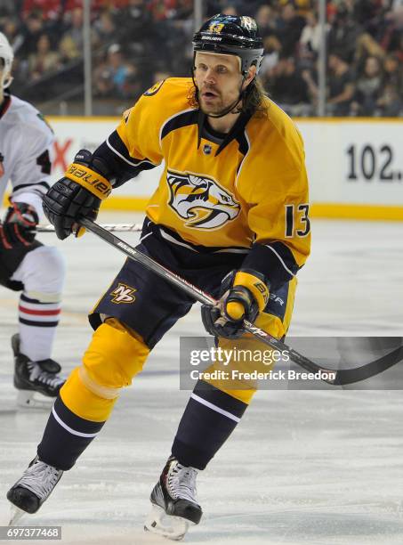 Olli Jokinen of the Nashville Predators plays in the game against the Chicago Blackhawks at Bridgestone Arena on December 6, 2014 in Nashville,...