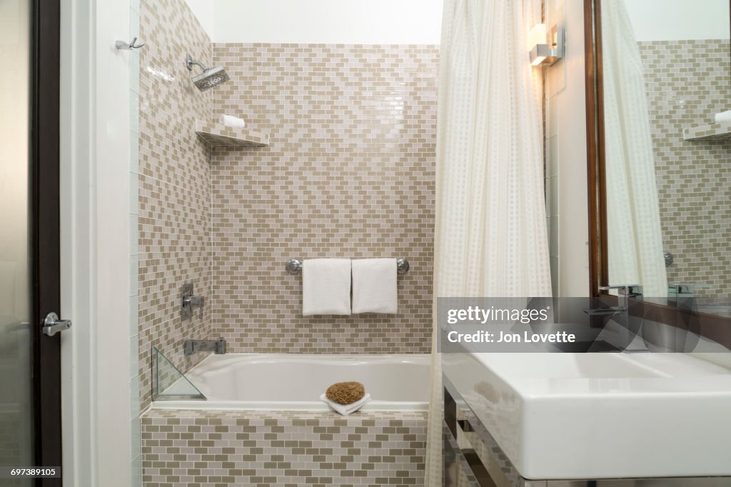 Modern Tiled Bathroom with Shower and Vanity