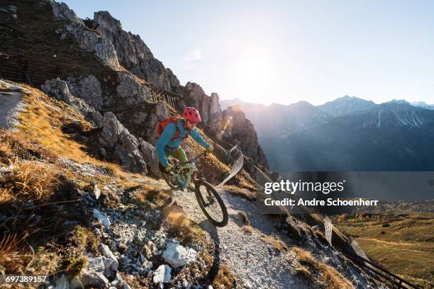 mountainbiking in the austrian alps - mountain bike fotografías e imágenes de stock