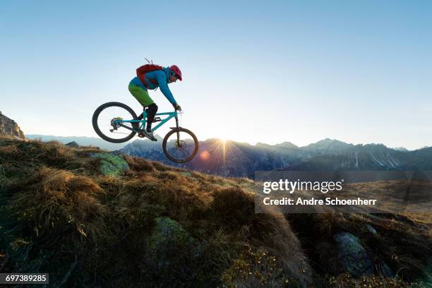 mountainbiking in the austrian alps - central eastern alps stock pictures, royalty-free photos & images