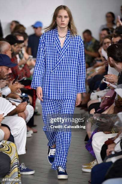 Model walks the runway at the Sunnei Spring Summer 2018 fashion show during Milan Menswear Fashion Week on June 18, 2017 in Milan, Italy.