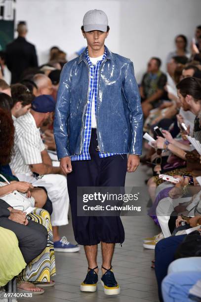 Model walks the runway at the Sunnei Spring Summer 2018 fashion show during Milan Menswear Fashion Week on June 18, 2017 in Milan, Italy.