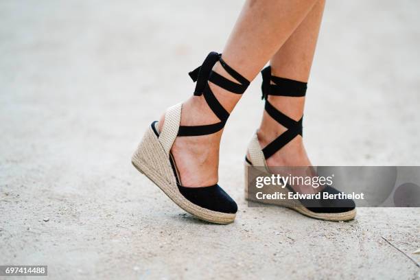 Sarah Benziane, fashion blogger, wears a Naive New Beater red t-shirt with the printed inscription "A La Folie" and a printed heart, a Pimkie blue...