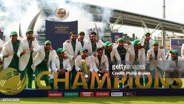The Pakistan team celebrate with the trophy after winning the ICC Champions Trophy final match between India and Pakistan at the Kia Oval cricket...
