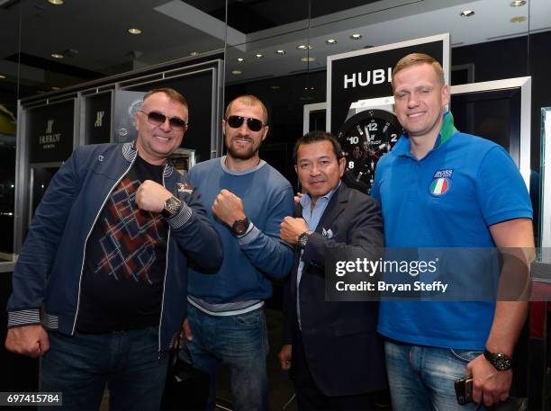 Boxing trainer Egis Klimas, boxer and Hublot ambassador Sergey Kovalev, Hublot Boutique Manager Hendrick Melles and Andrius Krukonis pose during...