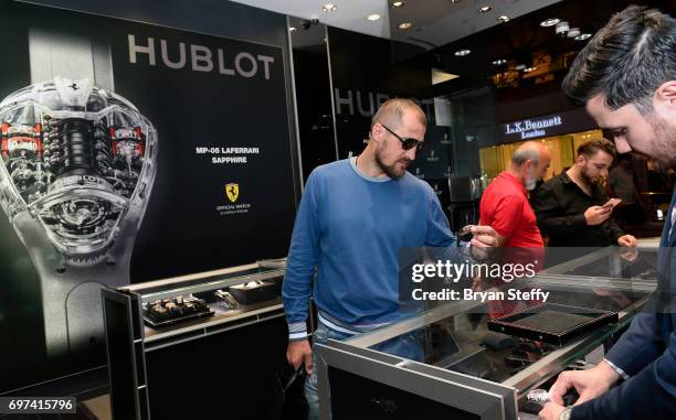 Boxer and Hublot ambassador Sergey Kovalev examines the Hublot Big Bang Unico during his visit to the Hublot Boutique at The Forum Shops at Caesars...